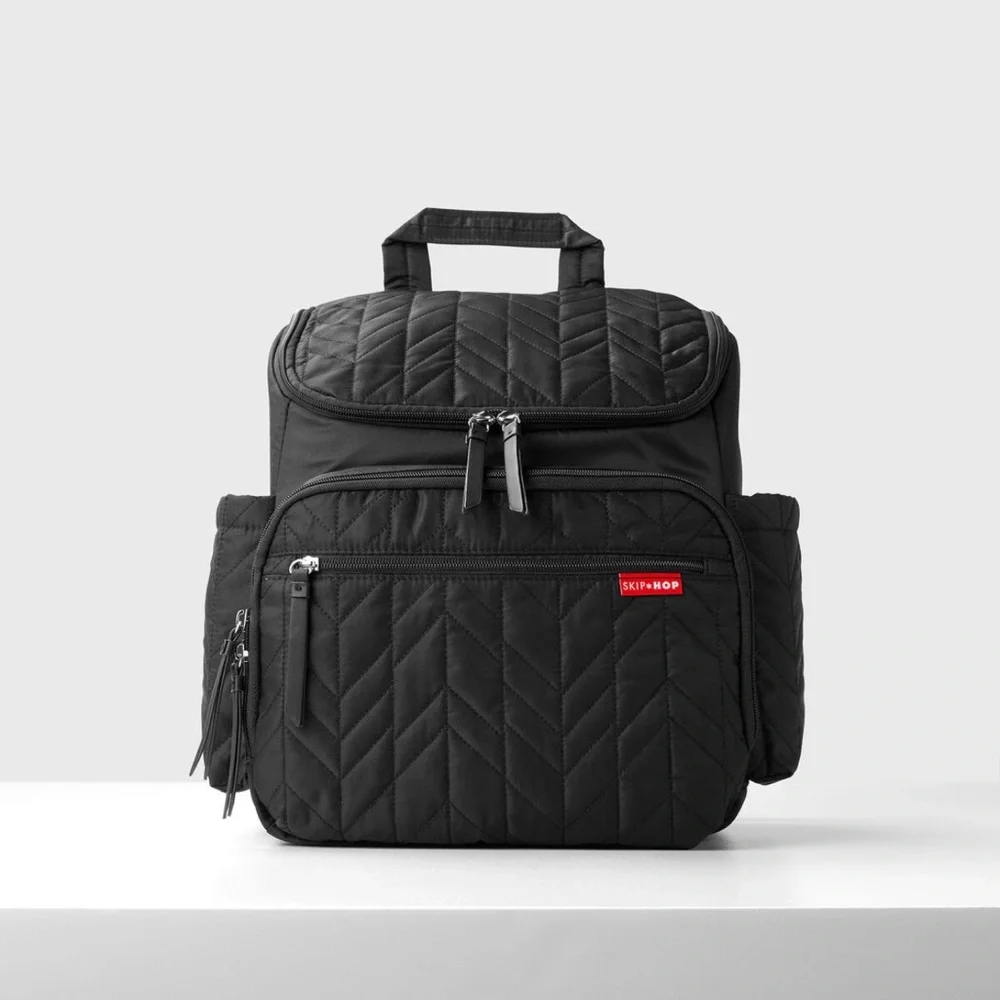 Skip Hop Forma Diaper Backpack. Black Exterior with Teal Interior.
